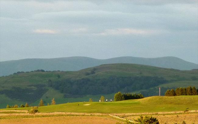 Golfers on Kendal Fell