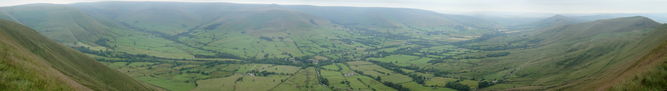 Panoramic view from Lord's Seat, with Kinder opposite and the Mam Tor ridge ahead overlooking the Edale valley.